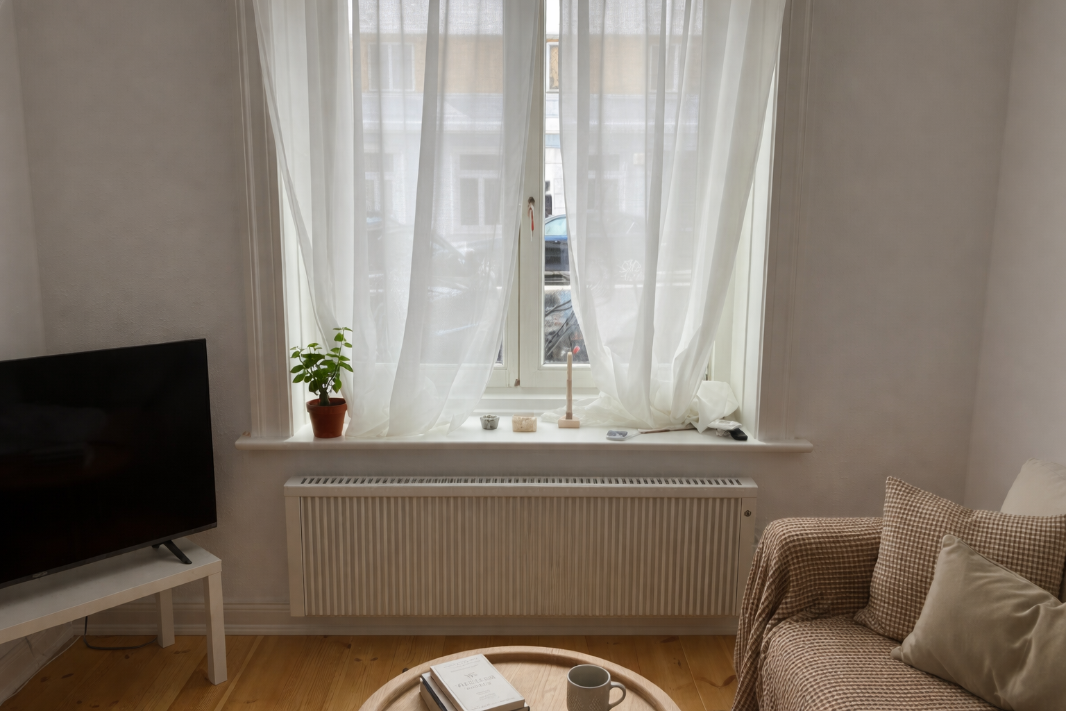 Heizungsmodernisierung im Wohnungsbestand mit Flächenspeicherheizung im Wohnzimmer | Energiekonzept Nordwest